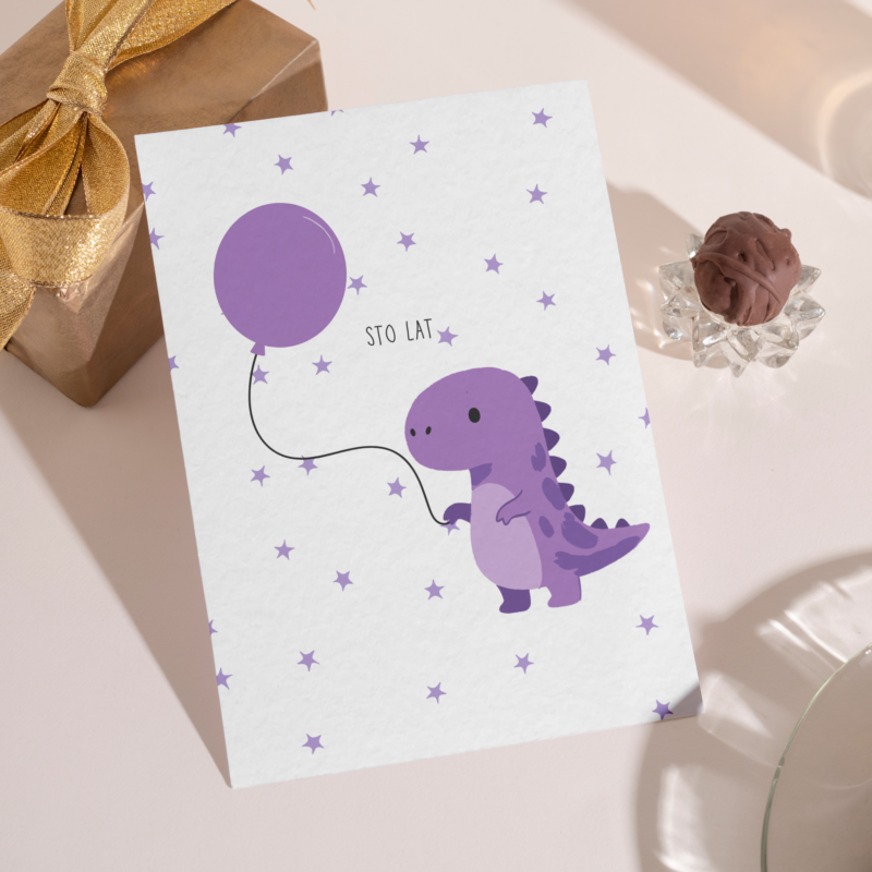Kartka okolicznościowa - Sto lat fioletowy dinuś - 12 x 17 cm